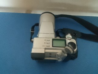 كاميرا أوليمبس ألترازووم يابانى أصلى لم تستخدم تقريبا و لكن تحتاج صيانة - Olympus Camedia C-2100 ultrazoom