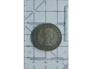 1957 Queen Elizabeth II one shilling coin.