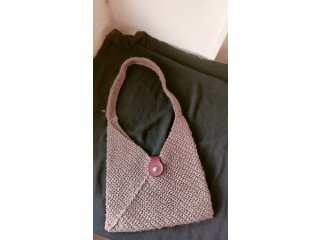 Handmade brown crochet envelope bag with leather magnet siding