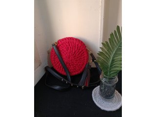 Homemade red crochet circle leather bag